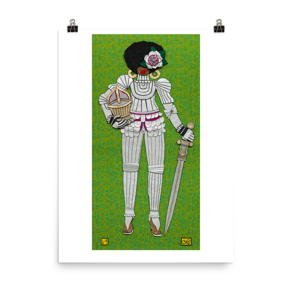 A print of one of Liz Ivey's fabric collages of a woman in armor against a green patterned background is hanging on a white wall.